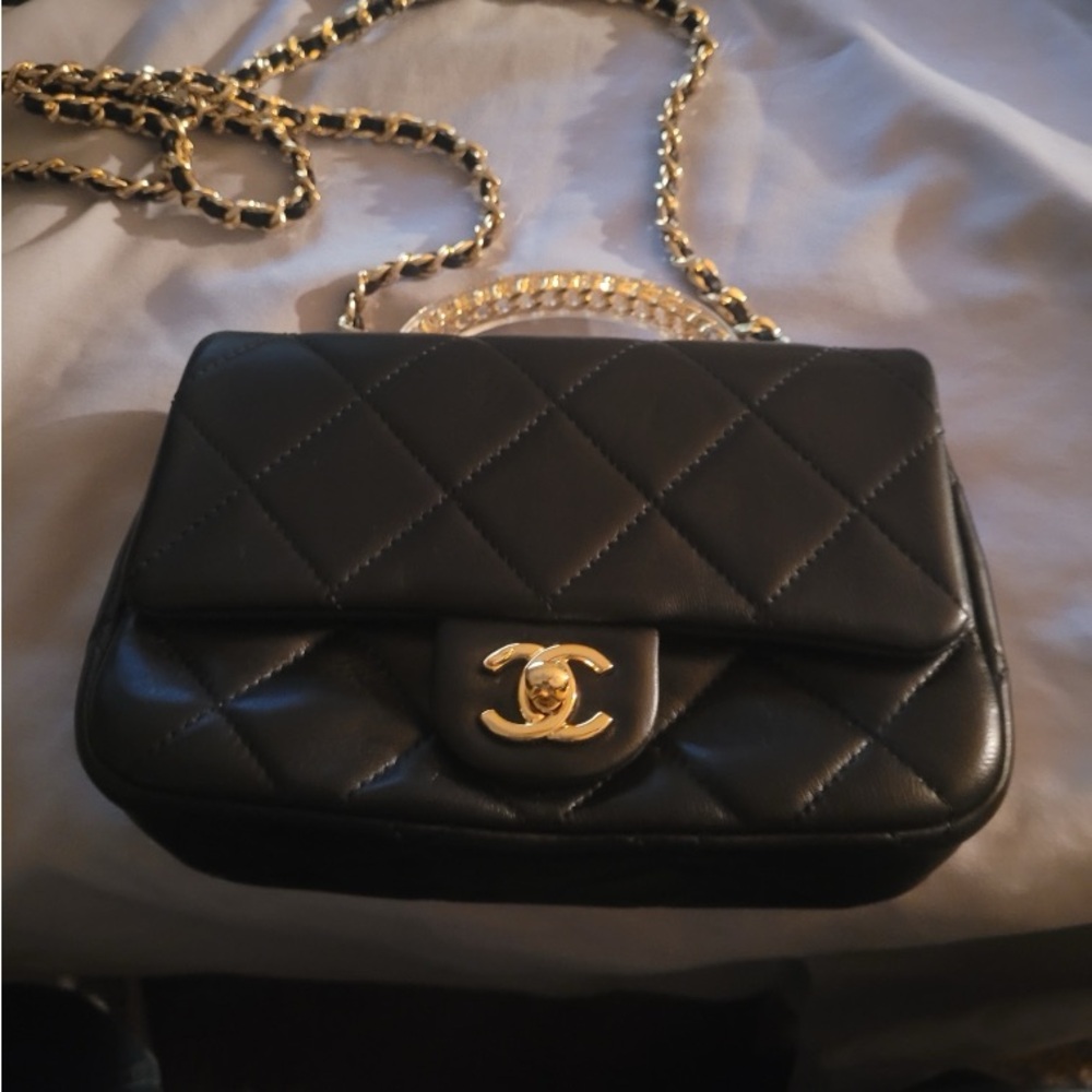 NWOT Chanel Black Quilted Lambskin Crossbody Bag with Gold Chain. Never used.